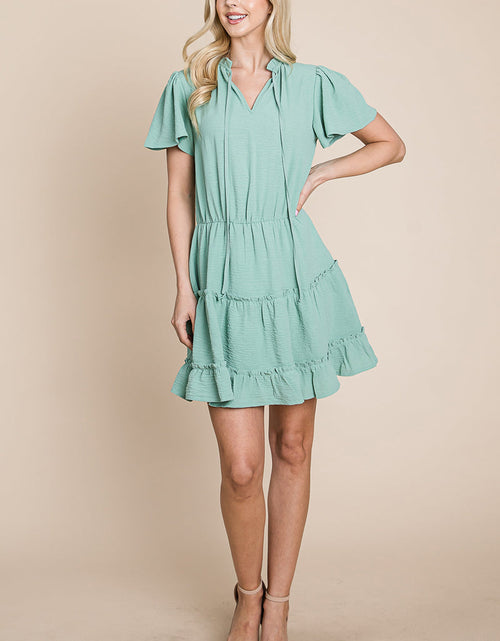 Load image into Gallery viewer, Tiered tie V neck Flutter Sleeve Flowy Tunic Dress
